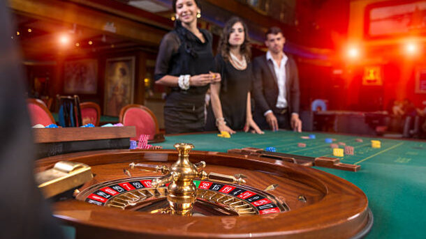 Group of young people playing roulette