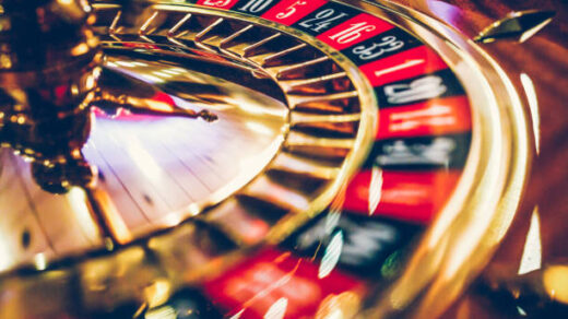 Spinning professional roulette wheel in casino. Property released.