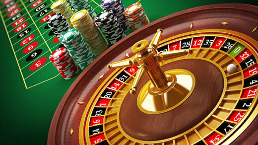 Roulette wheel and casino chips on the table.Similar images: